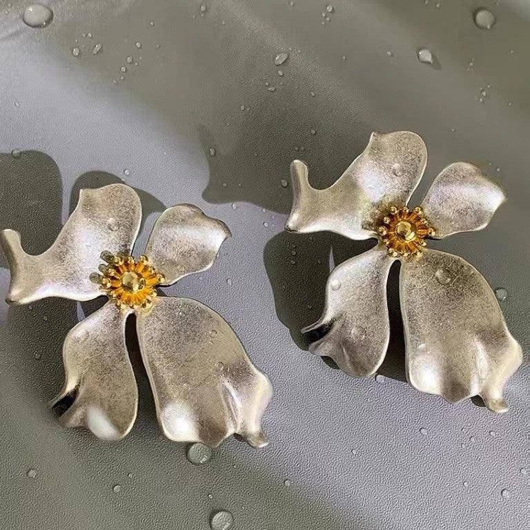 Silver flower stud earrings