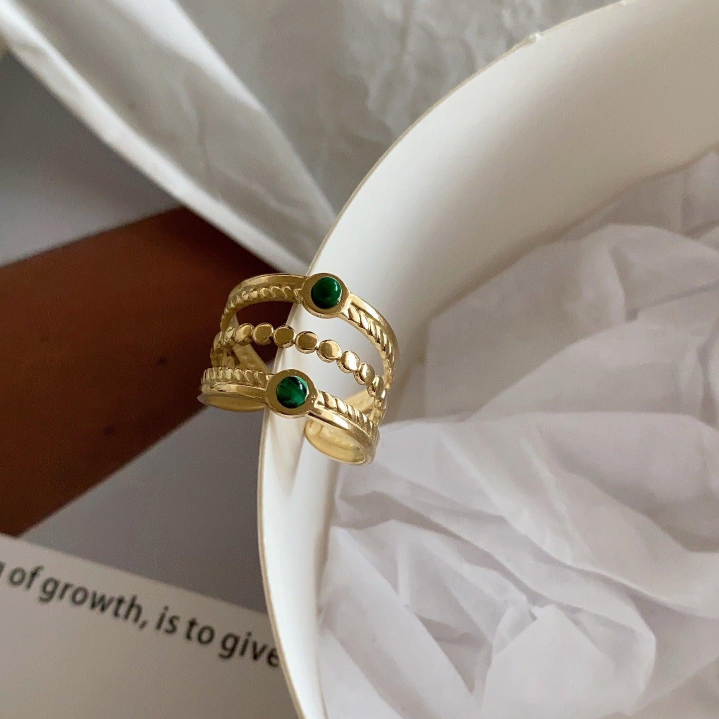 22K gold-plated malachite ring.