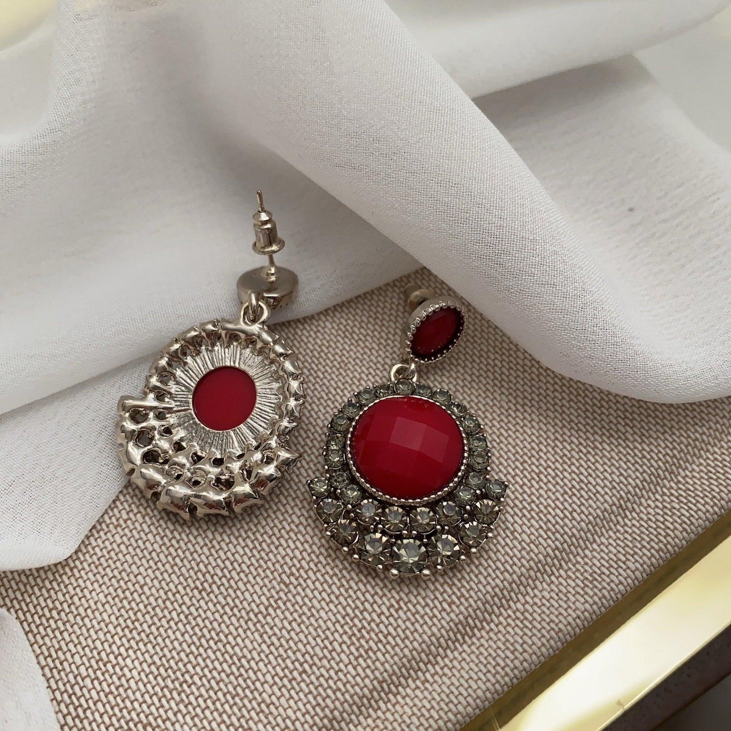 Baroque red earrings.