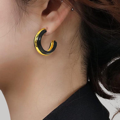 C-shaped metal earrings