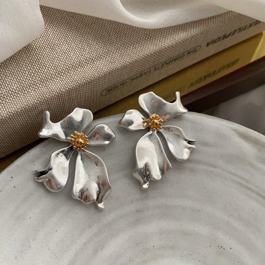 Silver flower stud earrings