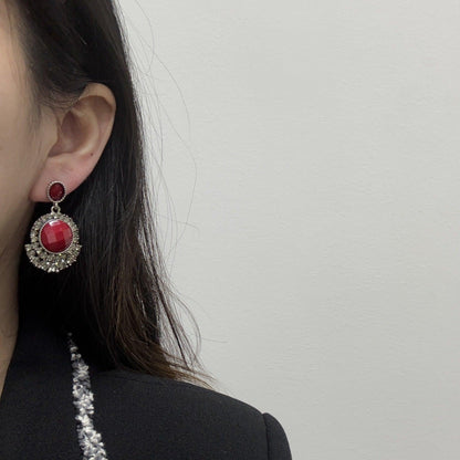 Baroque red earrings.