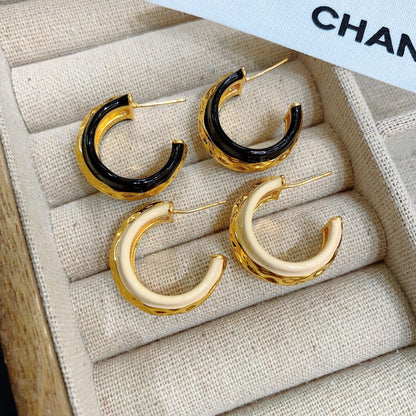 C-shaped metal earrings