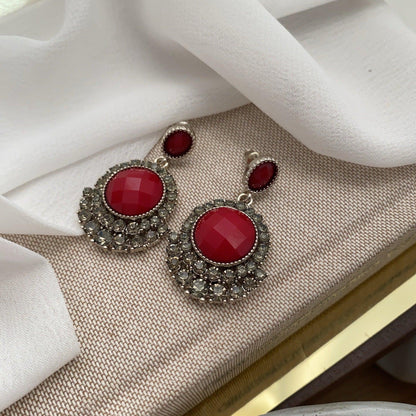 Baroque red earrings.