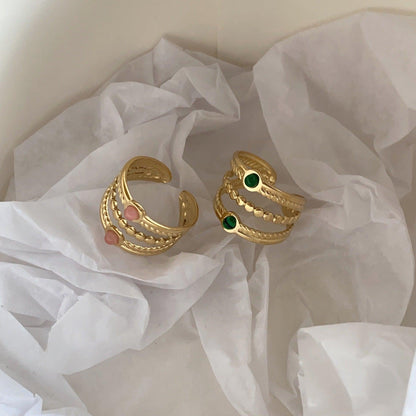 22K gold-plated malachite ring.